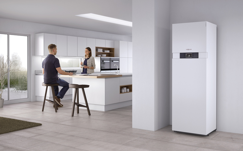 Moderne Gasheizung im Wohnbereich – effiziente Heiztechnik für Einfamilienhäuser Moderne Gasheizung in einer offenen Küche mit Wohnbereich, effiziente und platzsparende Heizlösung für ein Einfamilienhaus