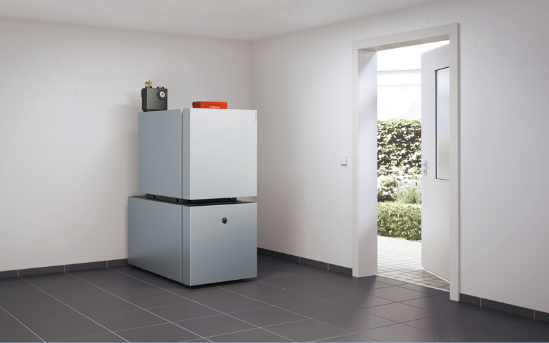 Moderne Ölheizung im Hauswirtschaftsraum – zuverlässige Heiztechnik für Wohnhäuser Moderne Ölheizungsanlage in einem Hauswirtschaftsraum, platzsparende und zuverlässige Heizlösung für Einfamilienhäuser